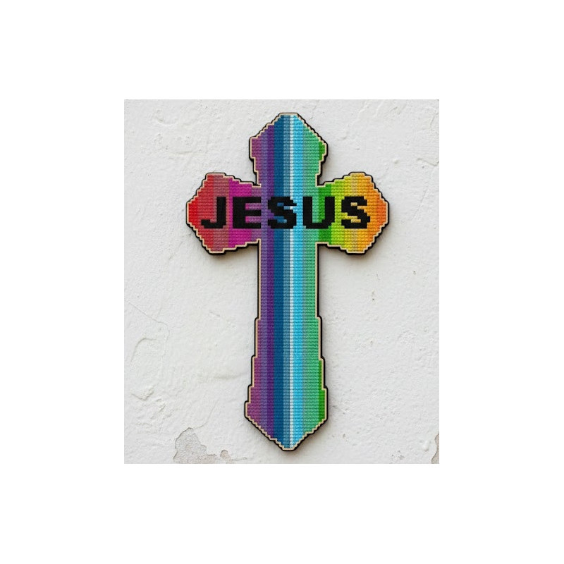 0cm laser-cut MDF wooden cross with Jesus engraving and dot art guides hanging on a wall.
