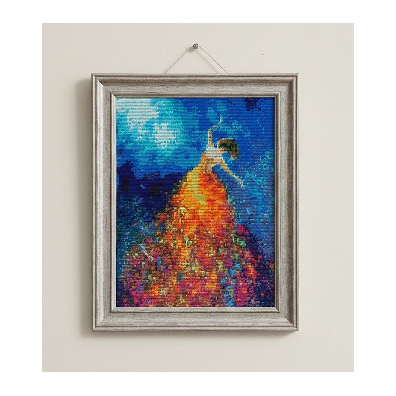 "Diamond art painting of a girl dancing in a sparkling gold and orange dress against a blue galaxy background"