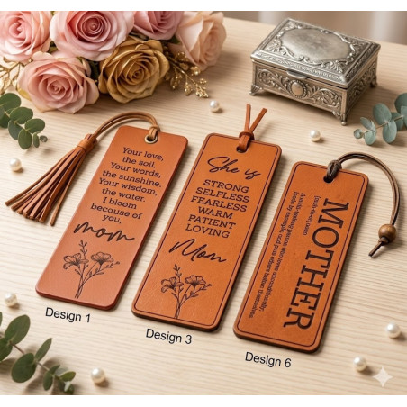Close-up of laser-engraved definition of mother on tan leather bookmark.