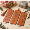 Close-up of laser-engraved definition of mother on tan leather bookmark.