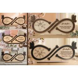 A custom-made wooden infinity-shaped plaque for Mother's Day with kids hands engraved