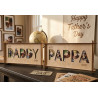 MDF wood photo frames on a decorated Father's Day mantel, with letter cutout and engraving both filled with family photos.